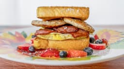 Capo's Mix & Match Sandwich - Egg, 2 piece of meat between 2 slices of French Toast & Cheese from Capo's Breakfast Spot in Albany, NY